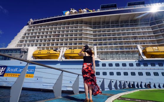 woman-looking-at-a-cruise-ship